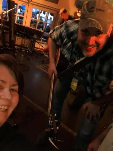 Fan selfie with Mark backstage before a show