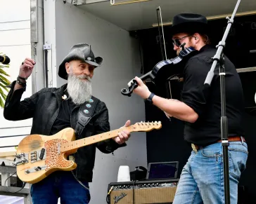 Musicians with guitars and drums