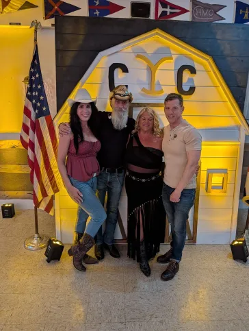 Band members posing at CYC