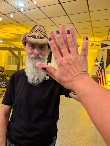 Mark giving a high five at the show