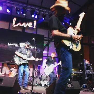 Full band performing at the Silver Dollar Saloon