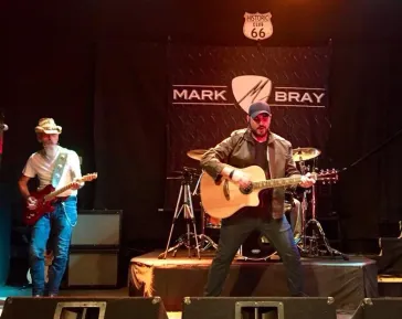 Dino at the American Country Countdown studios