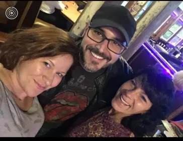 Mark with two fans at an after-show gathering